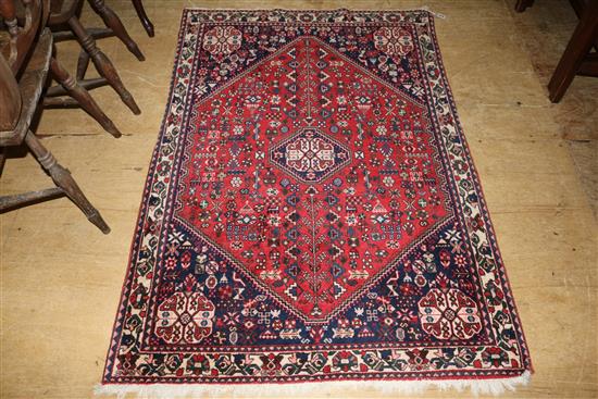 Persian red ground, with octagonal medallion